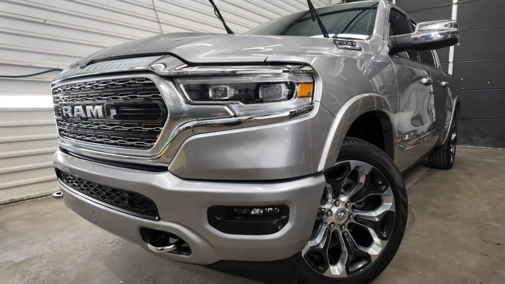 Front three-quarter view of a silver Ram 1500 fully protected with PPF, ceramic coating, and tint at Front Range Detail Studio.