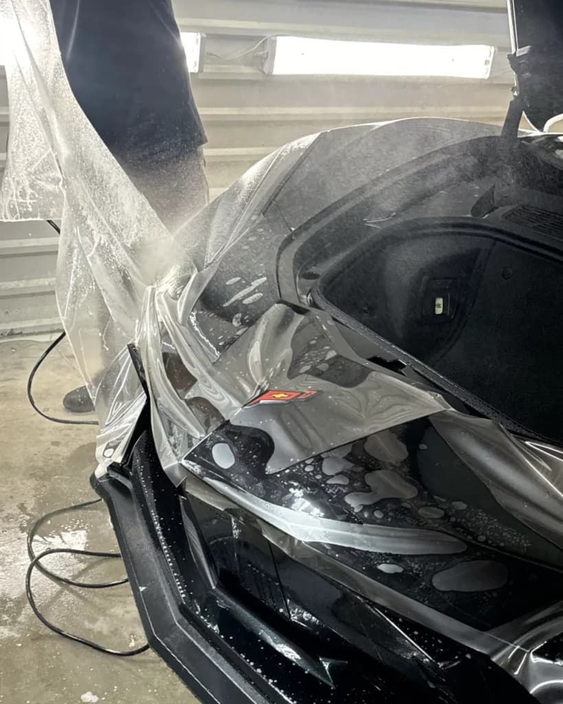 tech applying PPF (paint protection film) / Clear Bra